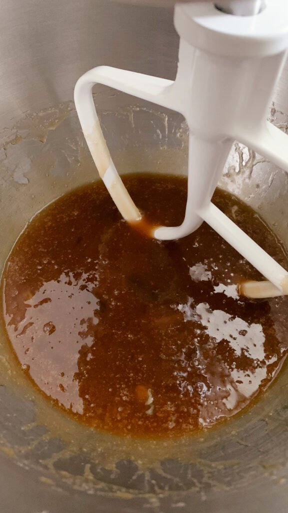 Brown sugar and wet ingredients for fresh milled banana bread coffee cake mixed together