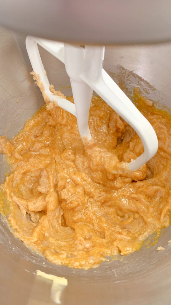 ingredients mixed together for fresh milled chocolate chip cookie bar dough in a mixing bowl