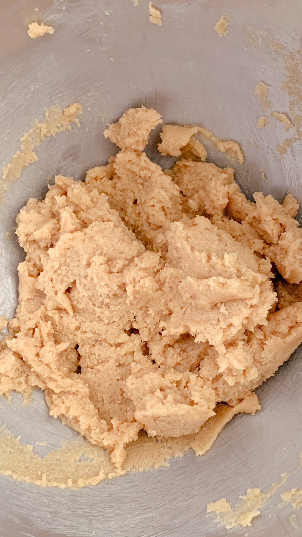 brown sugar and butter mixed together for fresh milled chocolate chip cookie bar dough in a mixing bowl