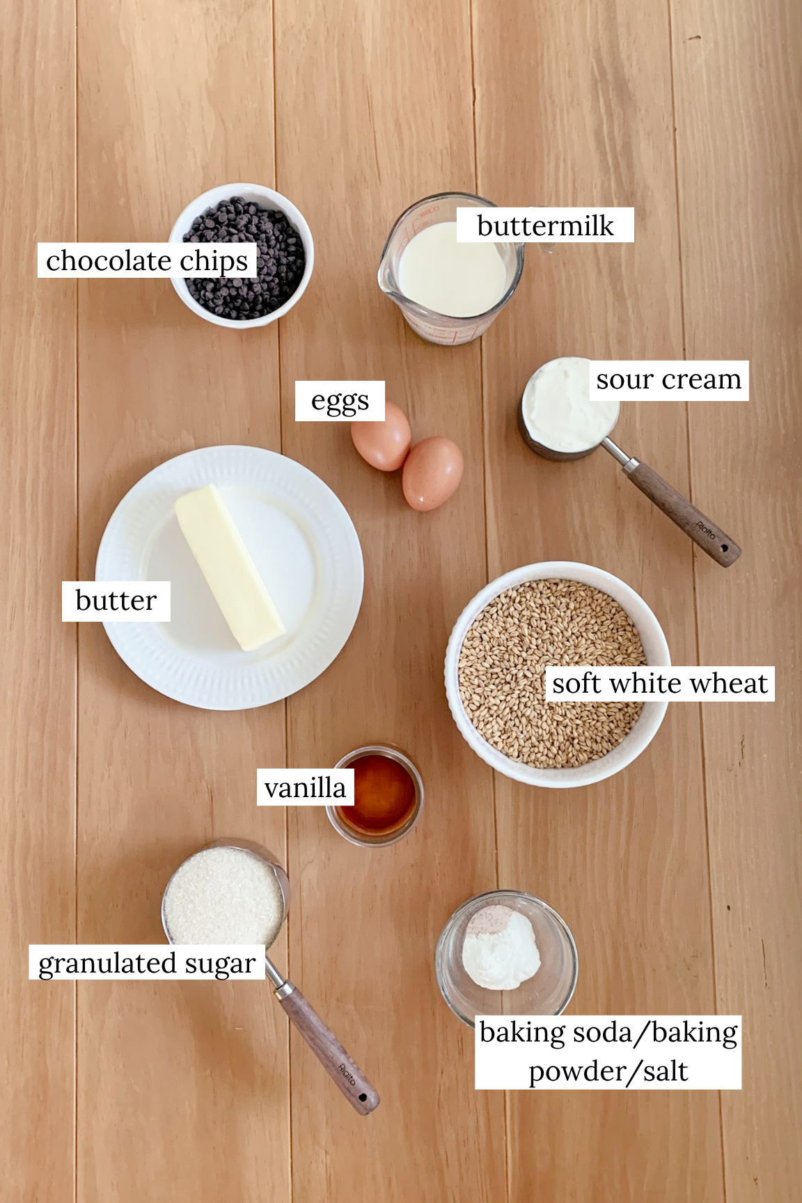 ingredients for fresh milled chocolate chip muffins on a wooden table