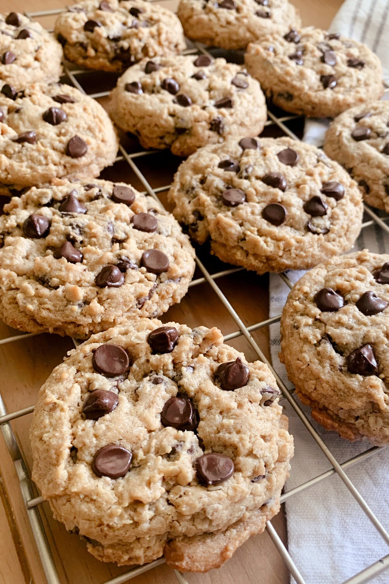 fresh milled peanut butter oatmeal chocolate chip cookies on a cooling rack