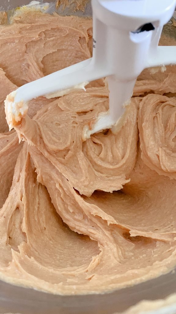 all of the wet ingredients mixed together for fresh milled peanut butter oatmeal chocolate chip cookie bars